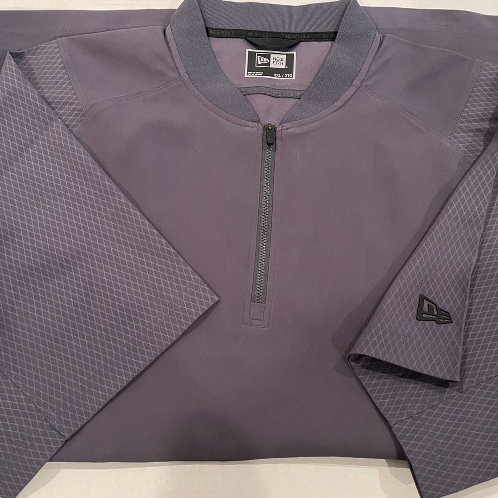 New era professional batting cage jacket. Coaches jacket